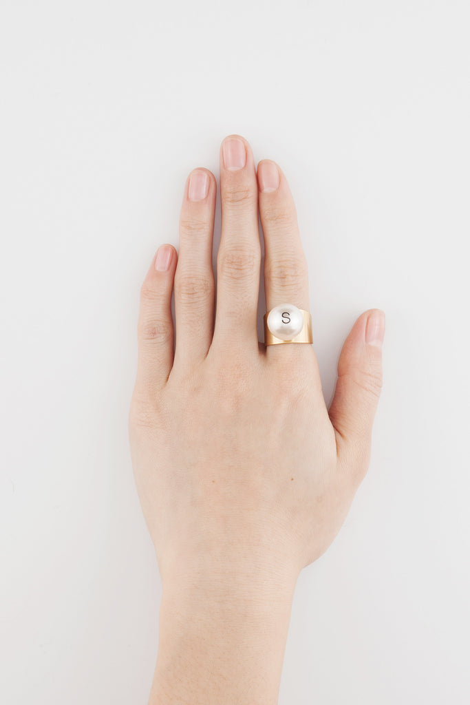big pearl helvetica ring by Monday Edition